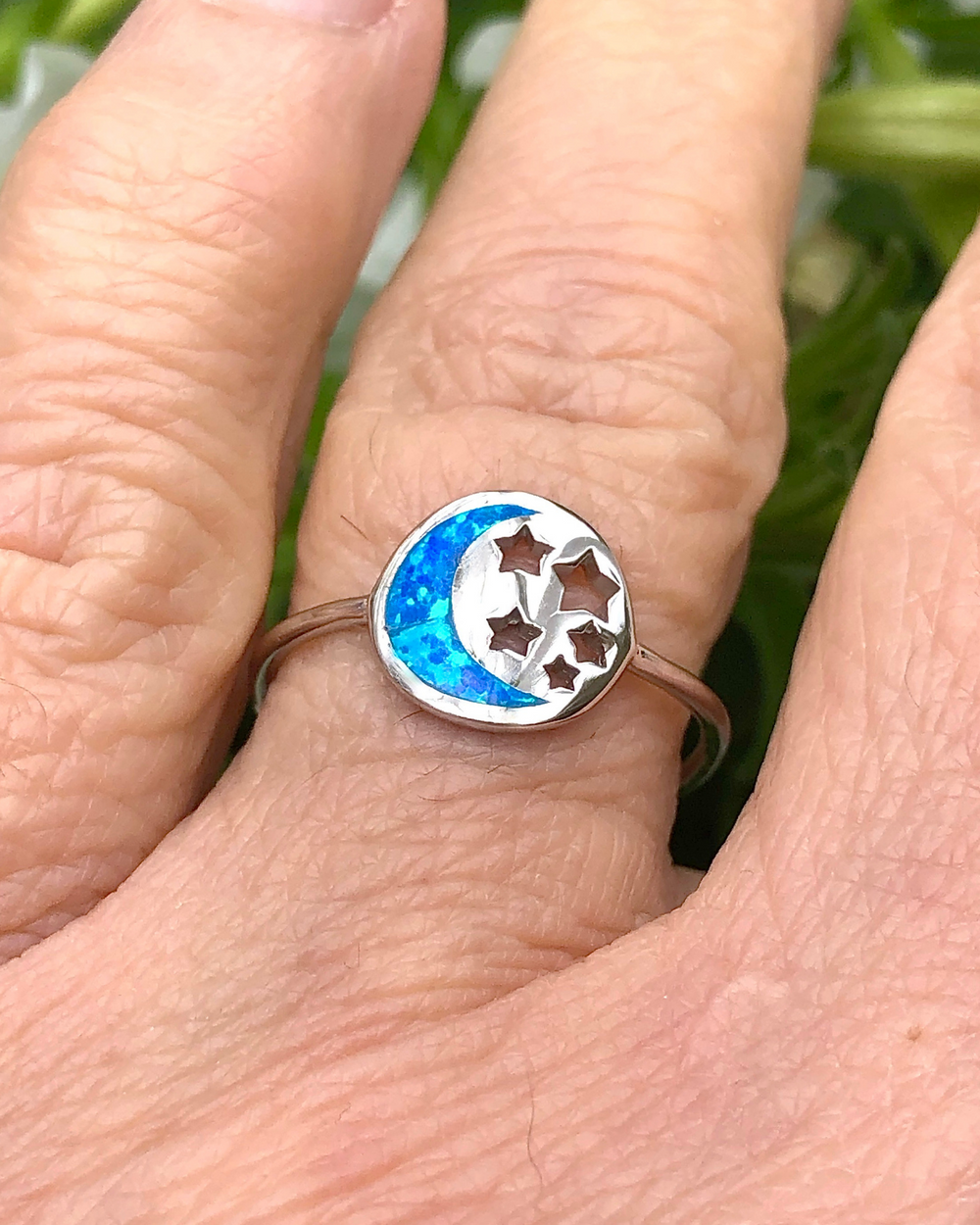 Sterling Silver Moon and Stars Blue Lab Opal Ring on finger