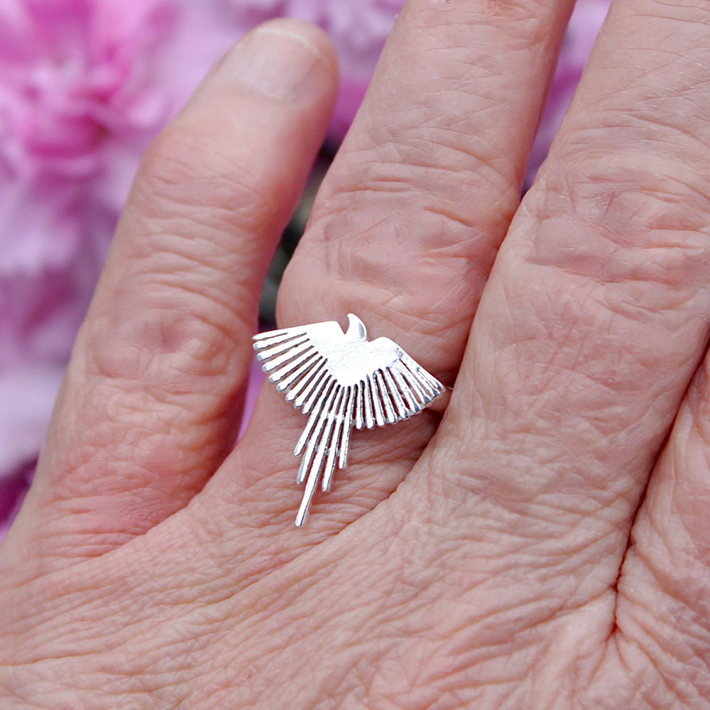 Sterling Silver Pheonix Ring on a finger