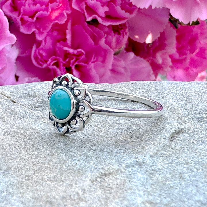 Sterling Silver Turquoise Lotus Flower Ring on stone side view