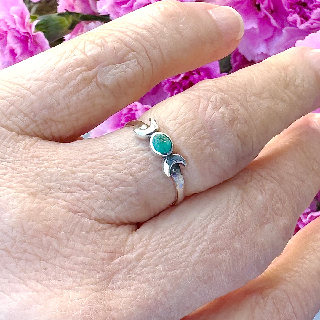 Sterling Silver Turquoise Moon Ring on finger close up