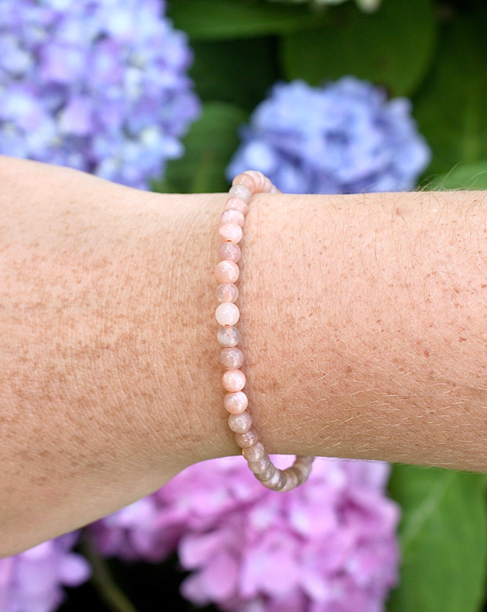 Sunstone 4mm Beaded Gemstone Bracelet on a wrist