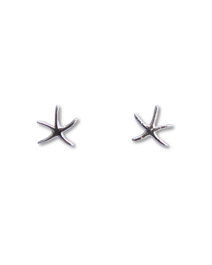 Thin Starfish Sterling Silver Earrings on a white background.