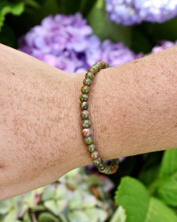 Unakite 4mm Beaded Gemstone Bracelet on a wrist.