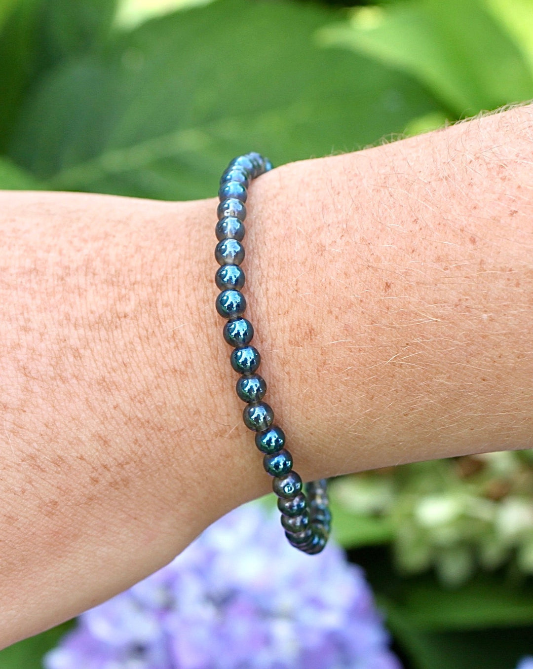 Aqua Aura 4mm Gemstone Bracelet on a Wrist