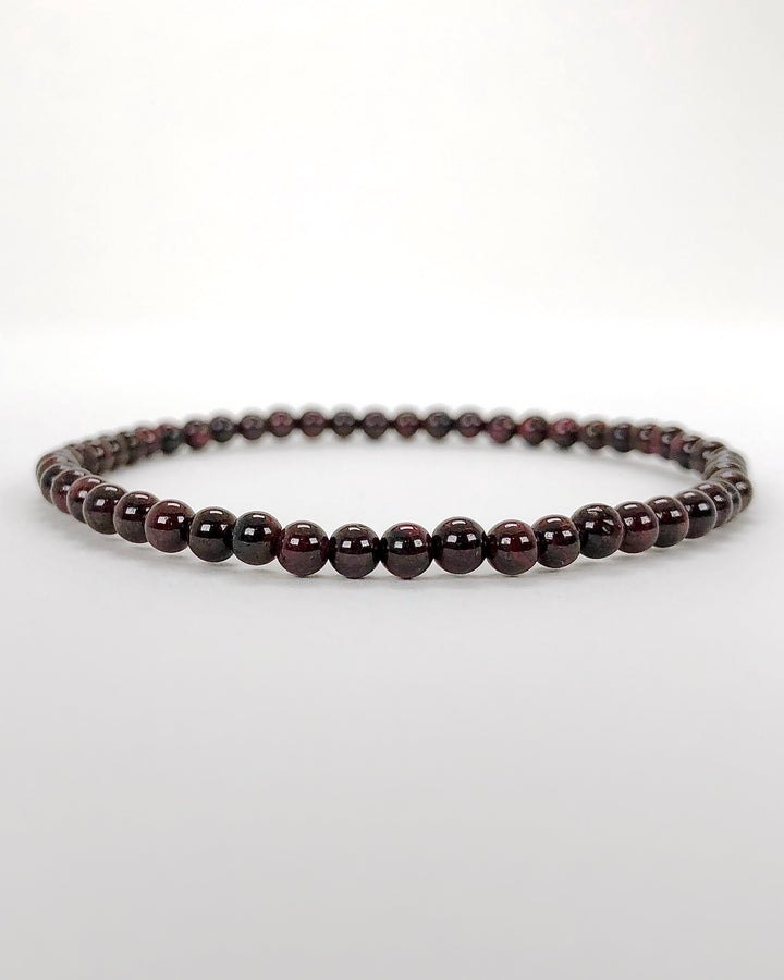 Garnet 4mm Beaded Gemstone Bracelet on white background