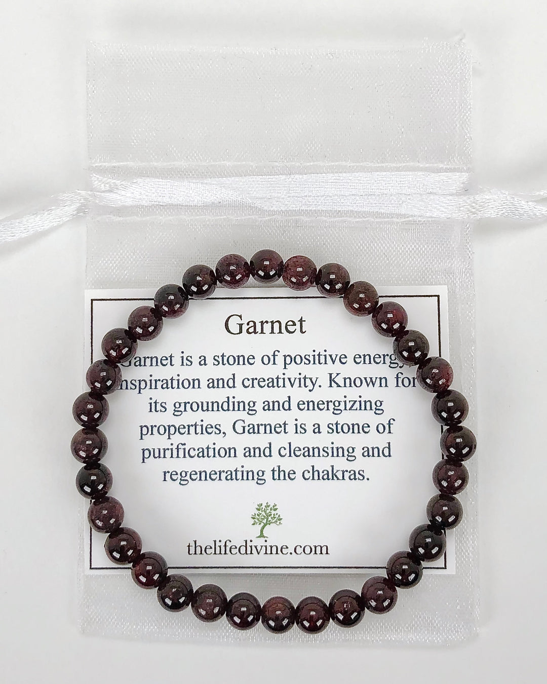 Garnet 6mm Beaded Gemstone Bracelet with a description card.