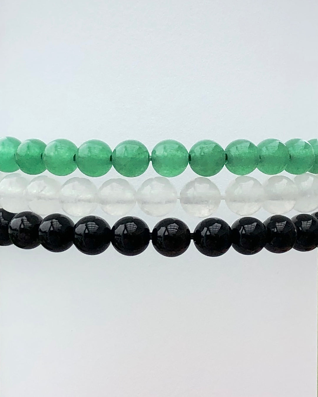 Aventurine, Snow Quartz and Black Agate Gemstone Bracelets. 
