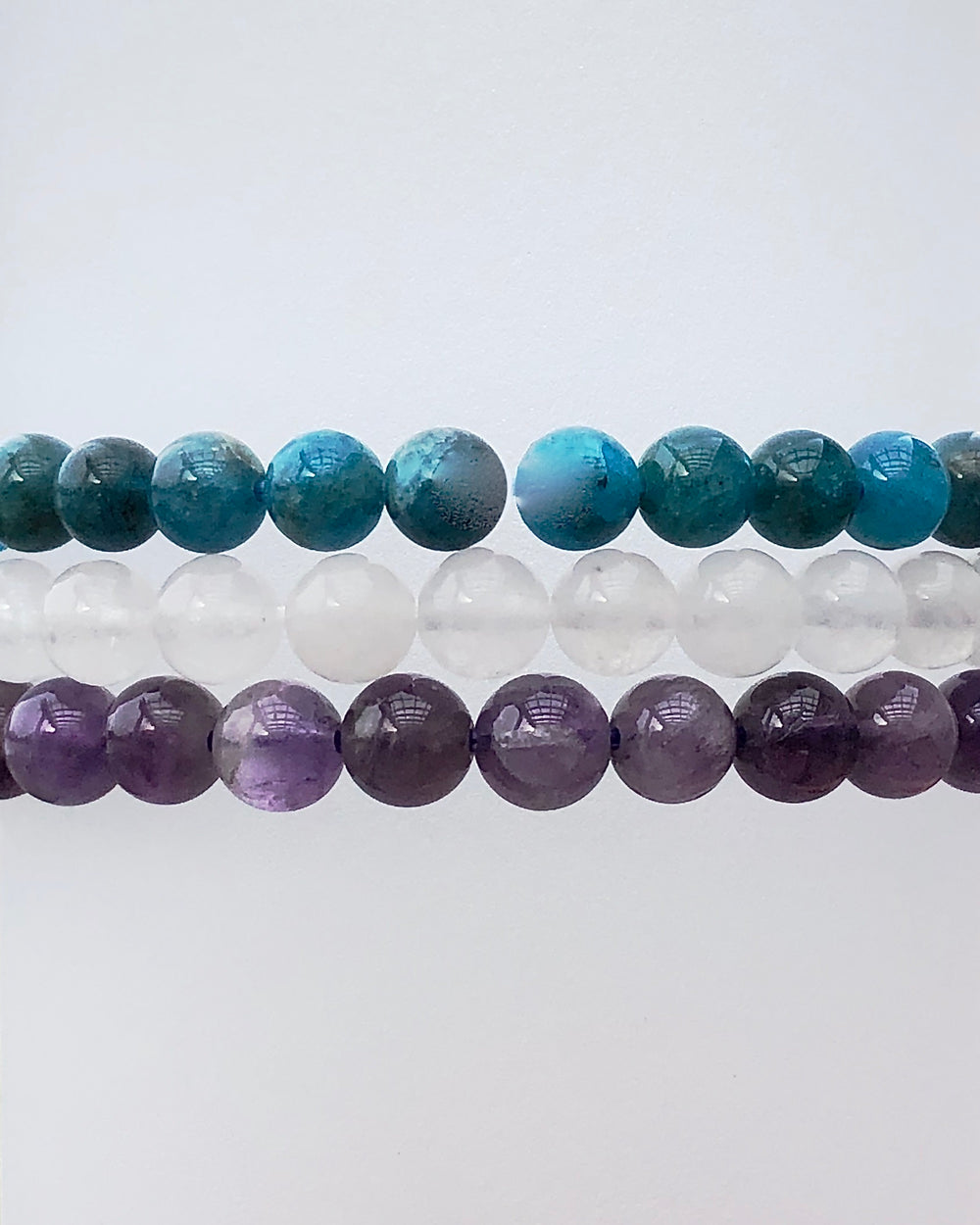 Amethyst, Snow Quartz and Apatite 6mm Beaded Gemstone Bracelet Set for Balance and Clarity.