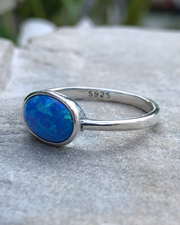 Sterling Silver Oval blue lab opal ring  showing 925 stamp