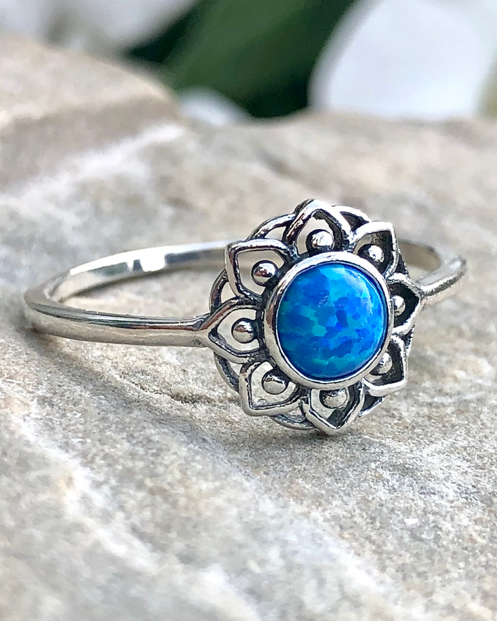 Blue Lab Opal Ring on stone