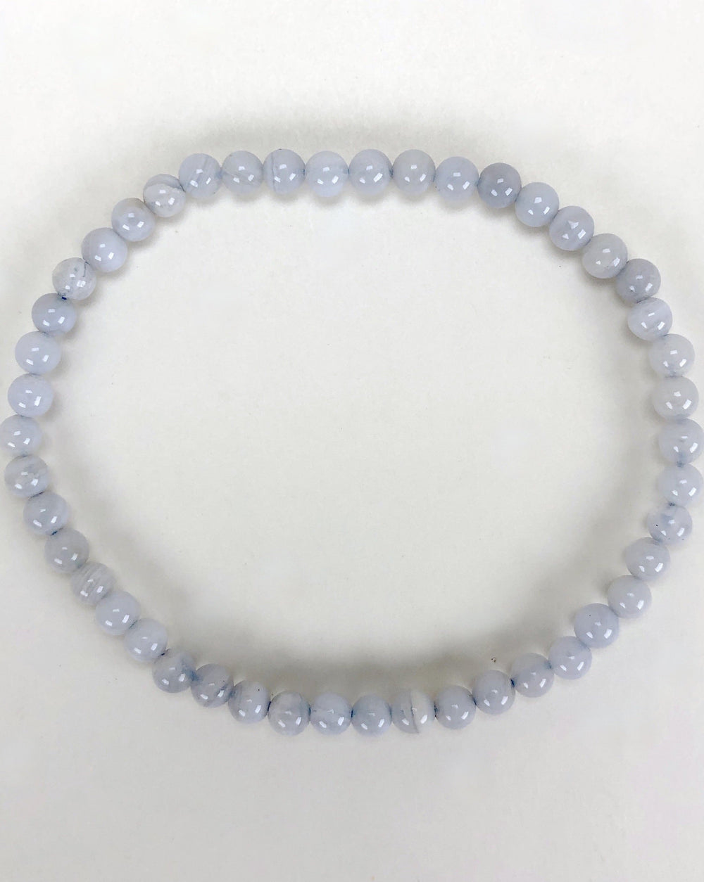 Men's Blue Lace Agate 4mm Gemstone Bracelet on a white background.