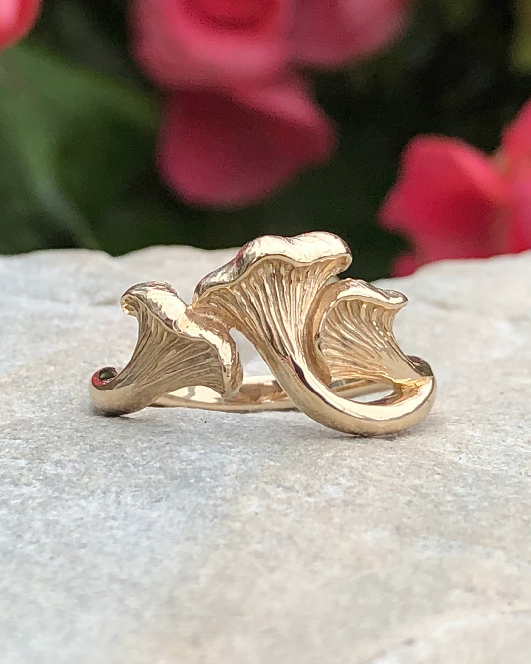 Bronze Chanterelle mushroom ring on a stone