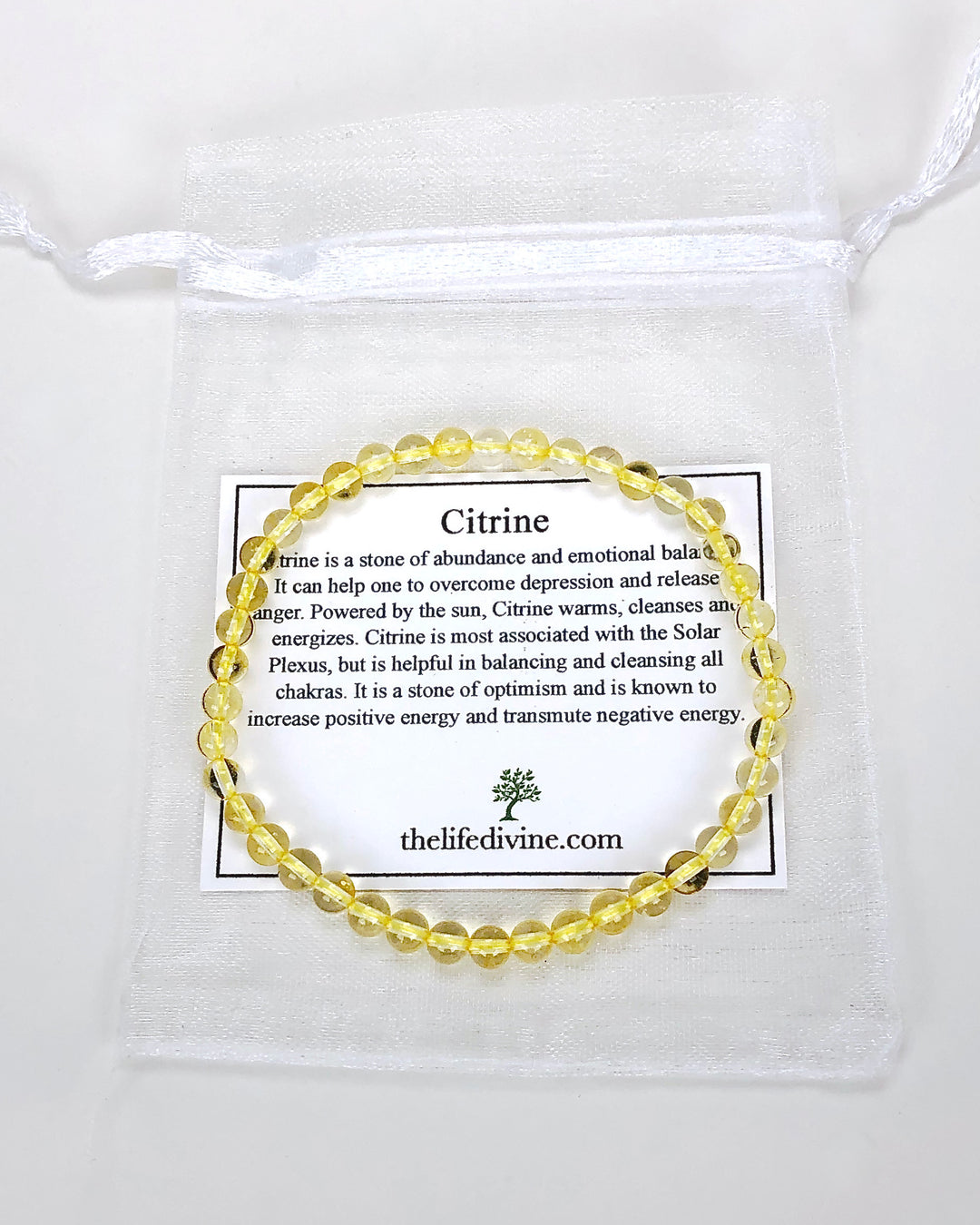 Citrine 4mm Gemstone Bracelet with a description card