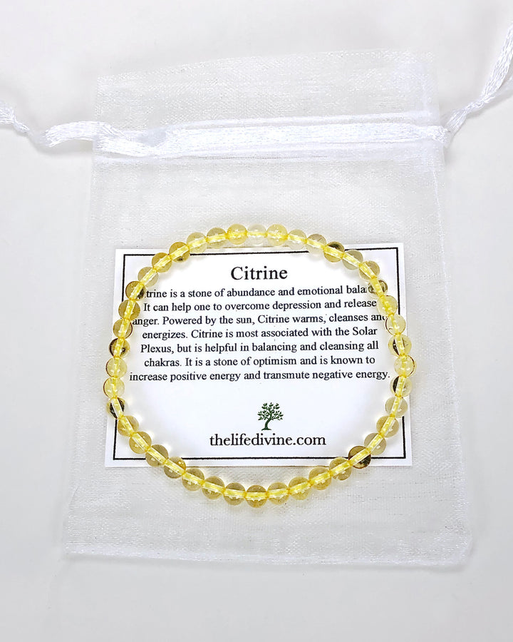 Citrine 4mm Gemstone Bracelet with a description card