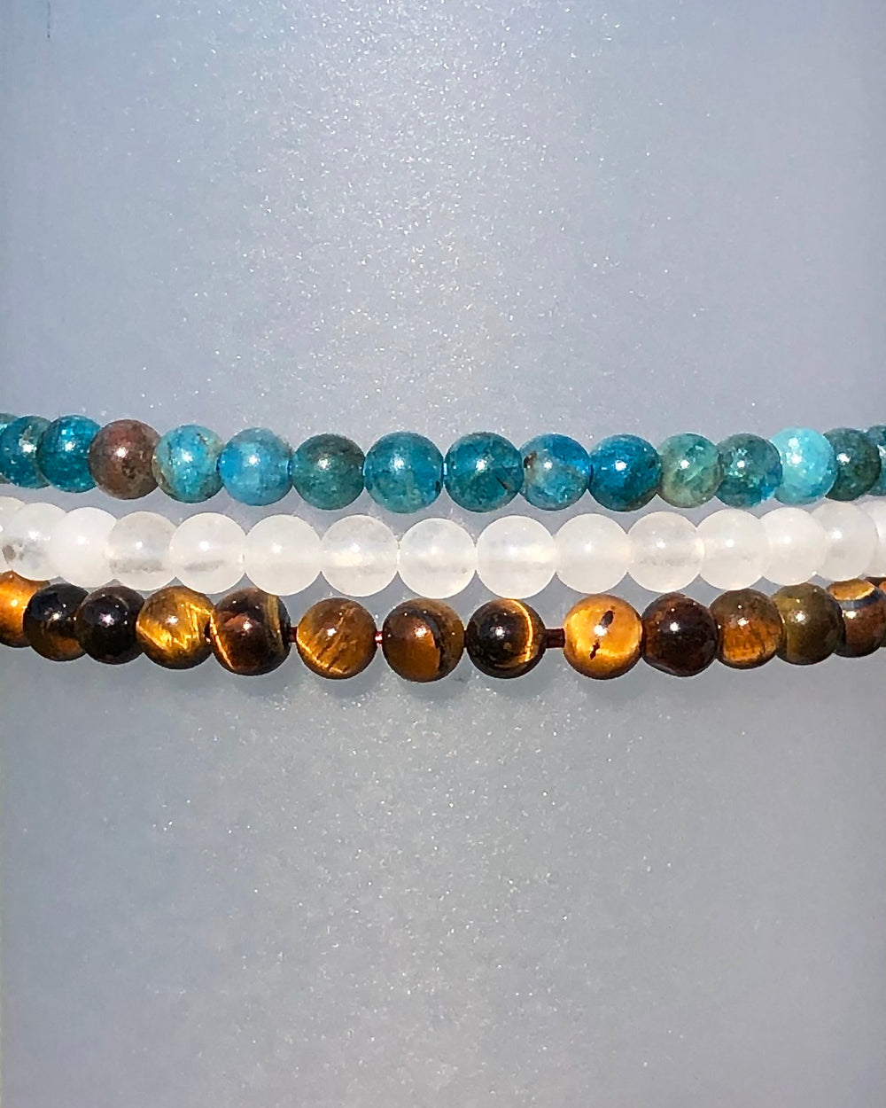 Apatite, Snow Quartz and Tiger Eye stacked beaded bracelets 