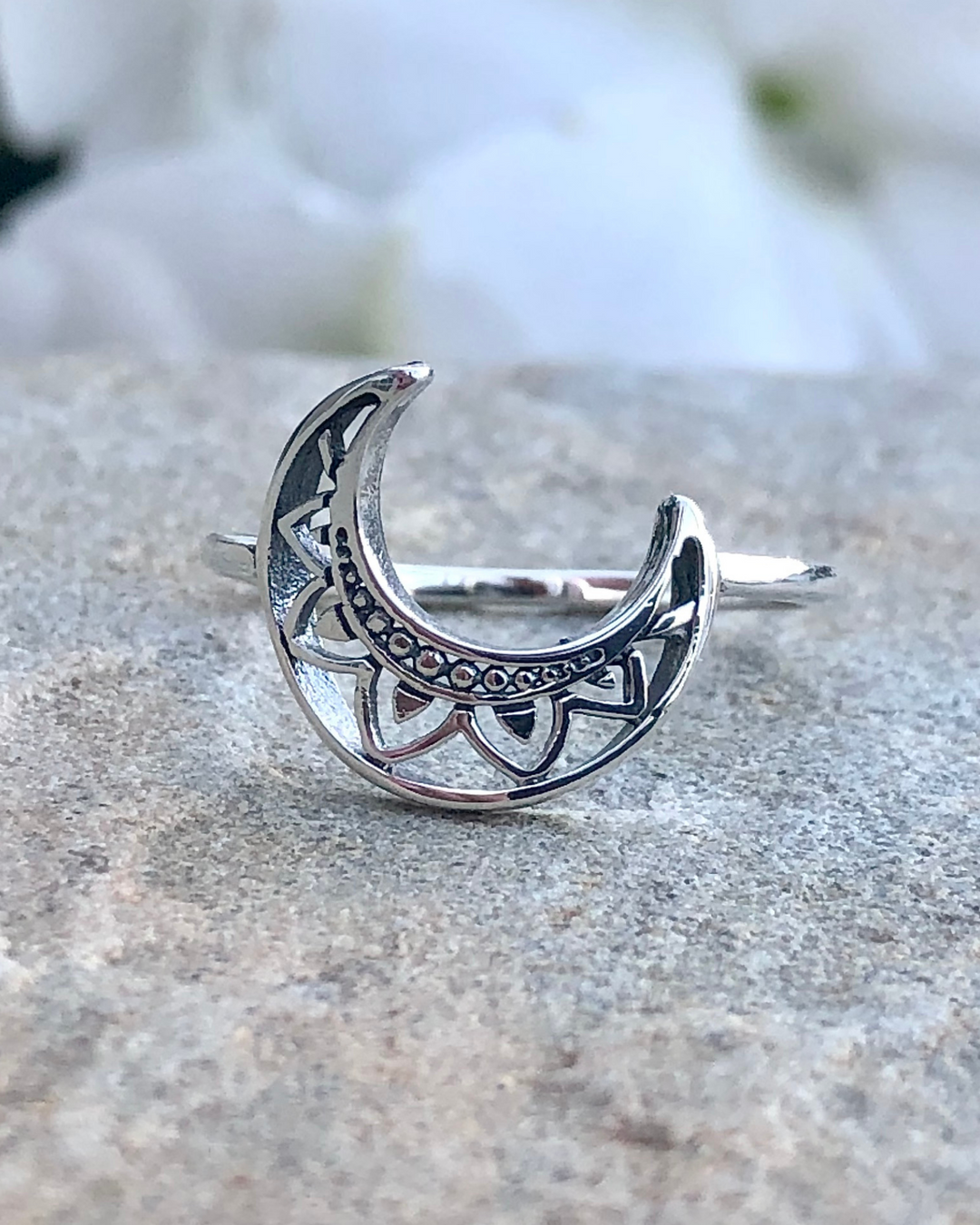 Crescent Moon Ring on stone close up