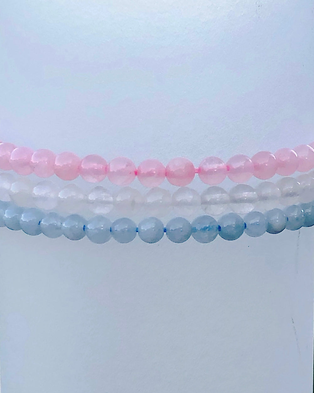 Aquamarine, Snow Quartz and Rose Quartz stacked beaded bracelets