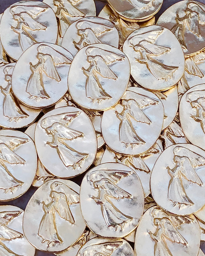 Gold pocket angel tokens