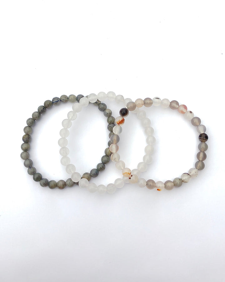 Botswana Agate, Snow Quartz and Labradorite Gemstone Bracelet Set for Inner Strength on a white background