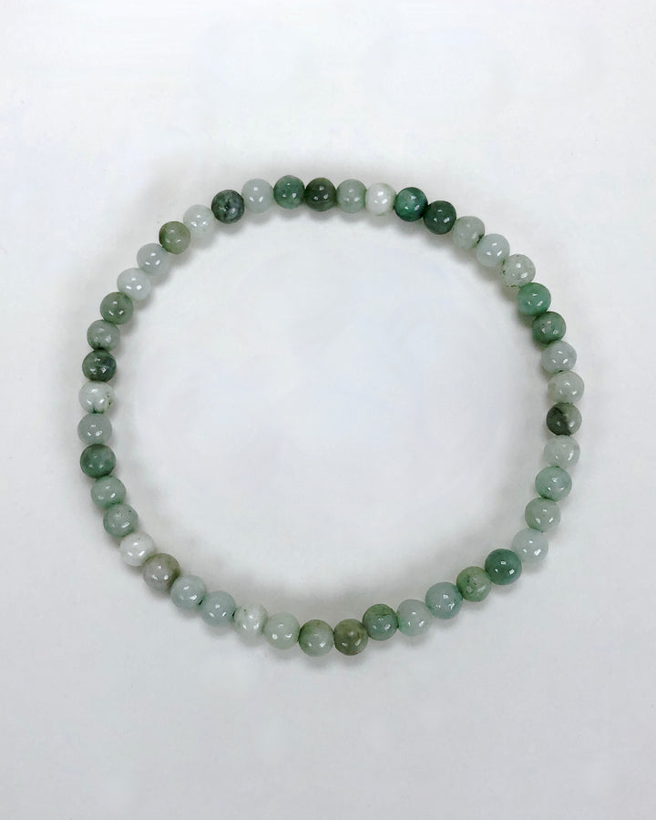 Jadeite 4mm Gemstone Bracelet on a white background.