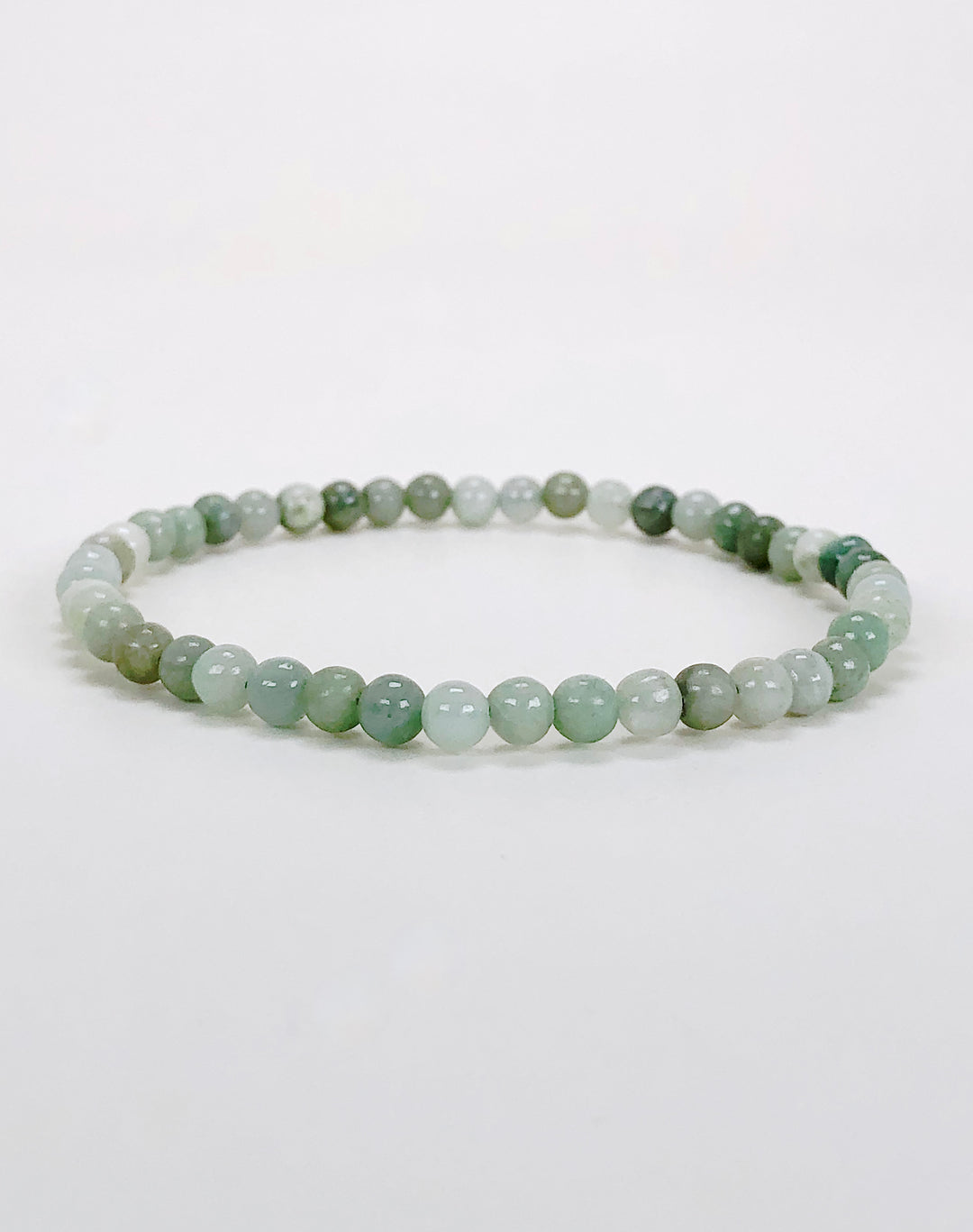 Jadeite 4mm Beaded Gemstone Bracelet on a white background.