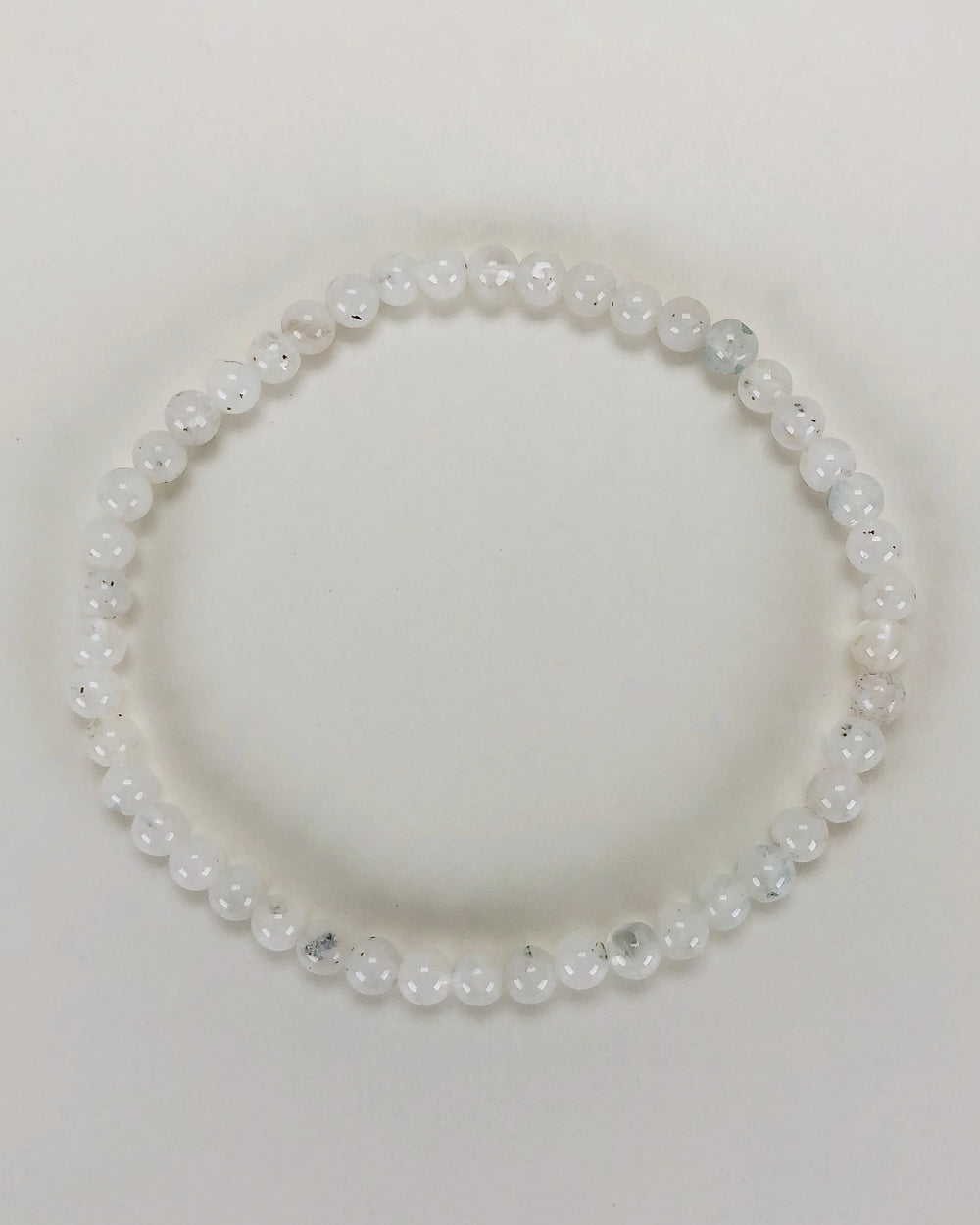 Men's Moonstone 4mm beaded Gemstone Bracelet on a white background.