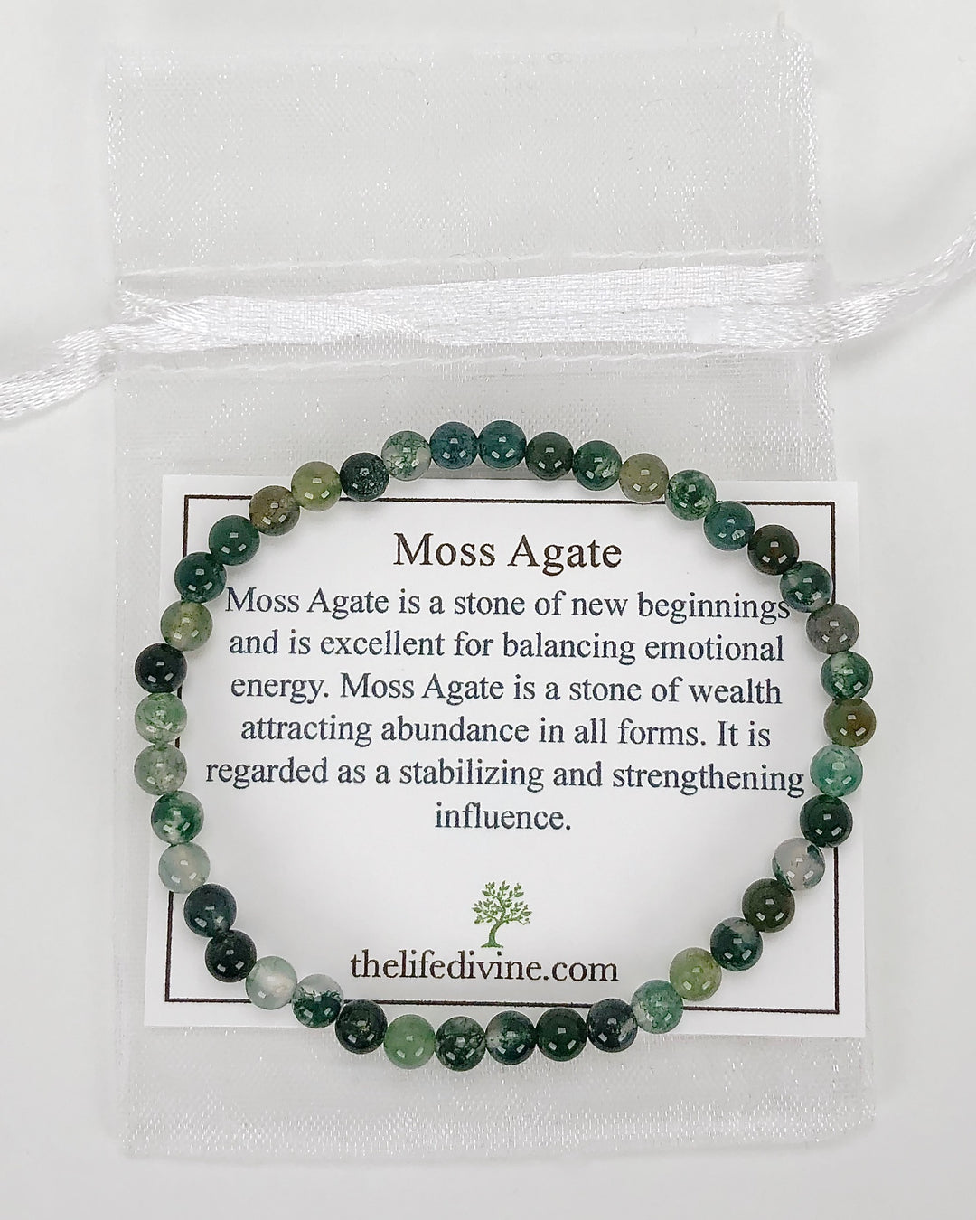 Moss Agate 4mm Beaded Gemstone Bracelet wit a description card.