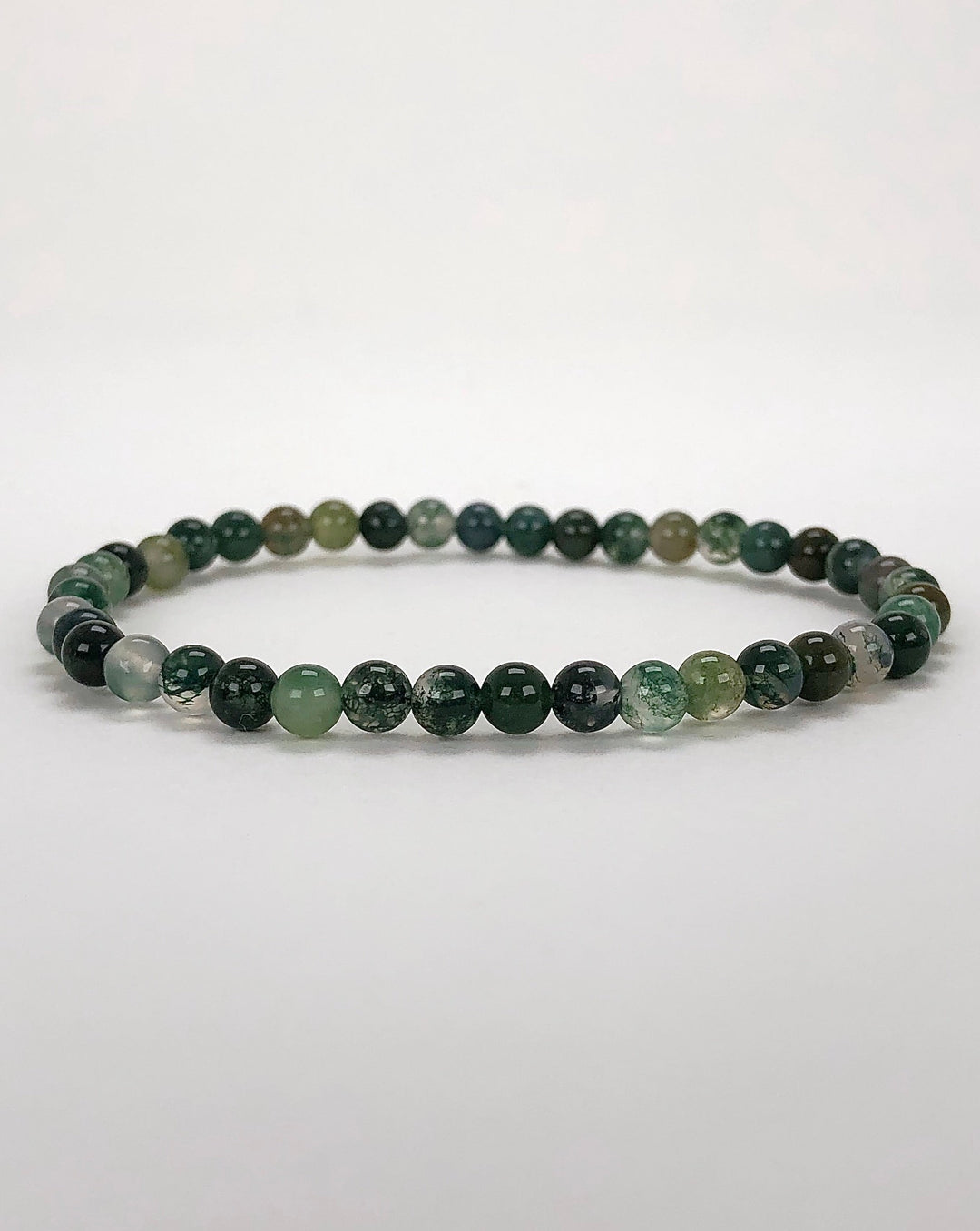 Moss Agate 4mm Beaded Gemstone Bracelet on a white background.