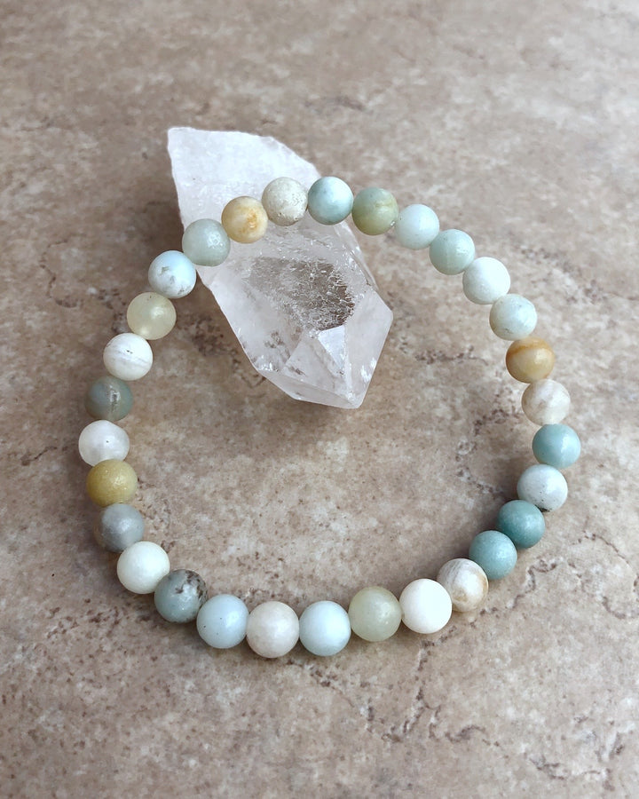 Multi Amazonite 6mm Beaded Gemstone Bracelet on a crystal.