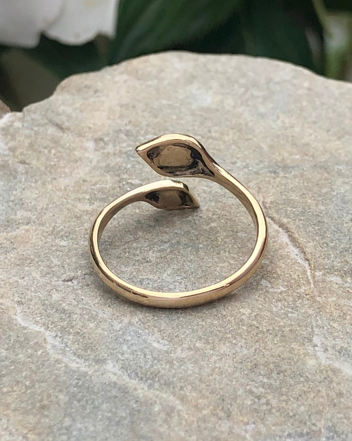 Om and Lotus Bronze Ring on stone back view 