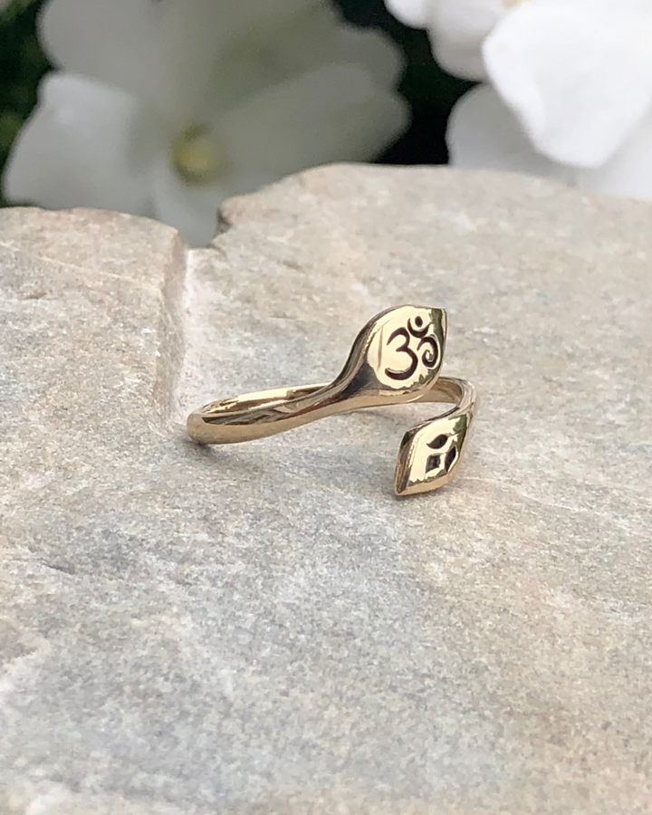 Om and Lotus Bronze Ring on stone side view