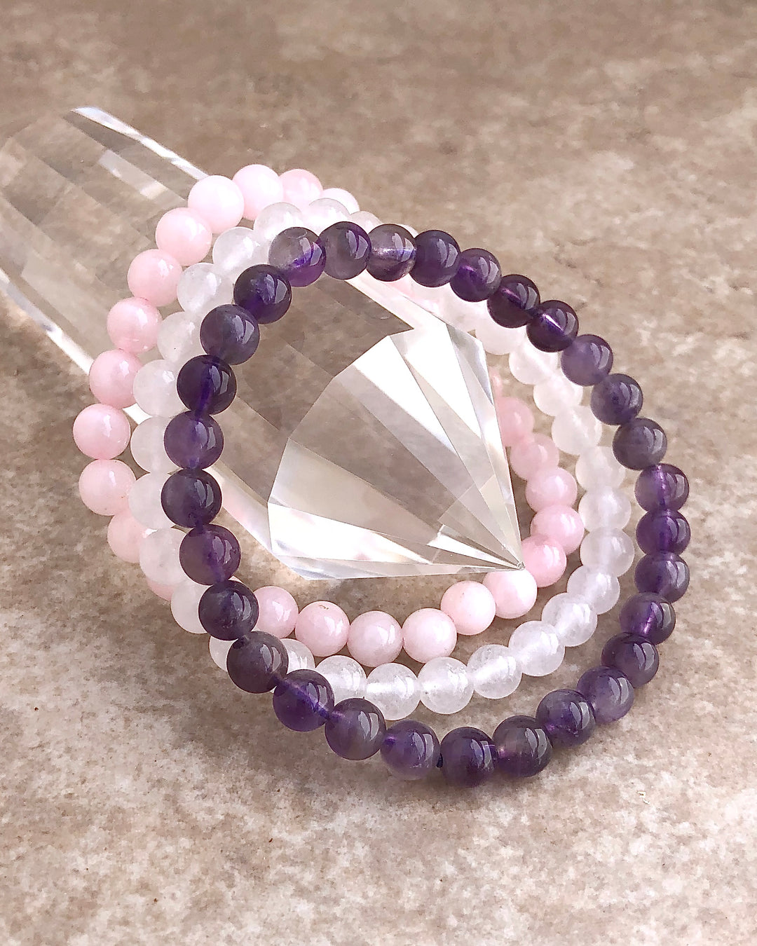 Rose Quartz, Snow Quartz and Amethyst 6mm Beaded Gemstone Bracelet Set for Peace and Compassion on a crystal.