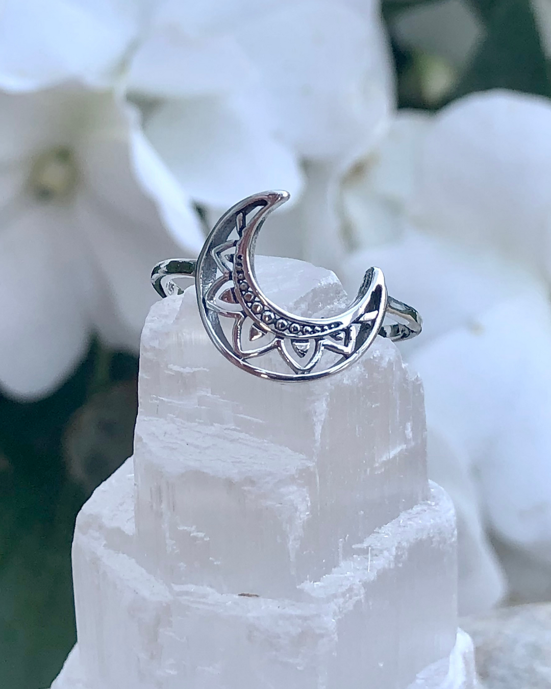 Silver Crescent Moon Ring on selenite