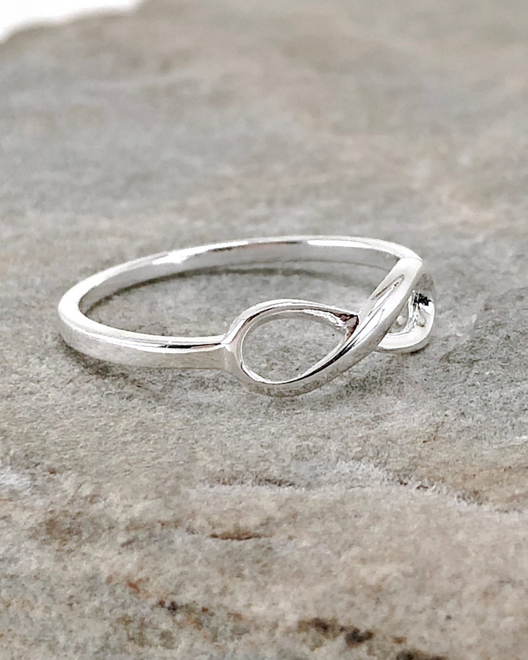 Silver Infinity Ring on stone side view