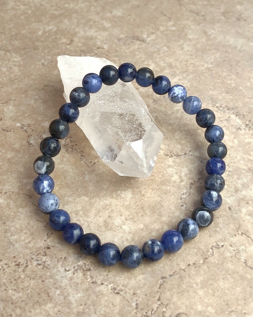 Sodalite 6mm beaded gemstone bracelet on a crystal