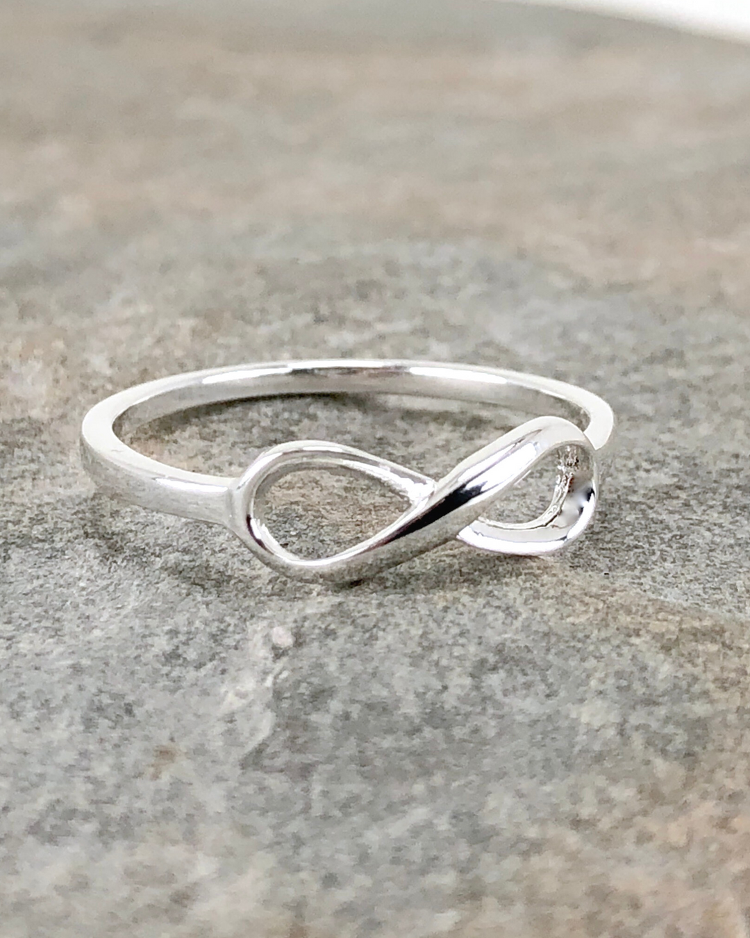 Sterling Silver Infinity Ring on stone