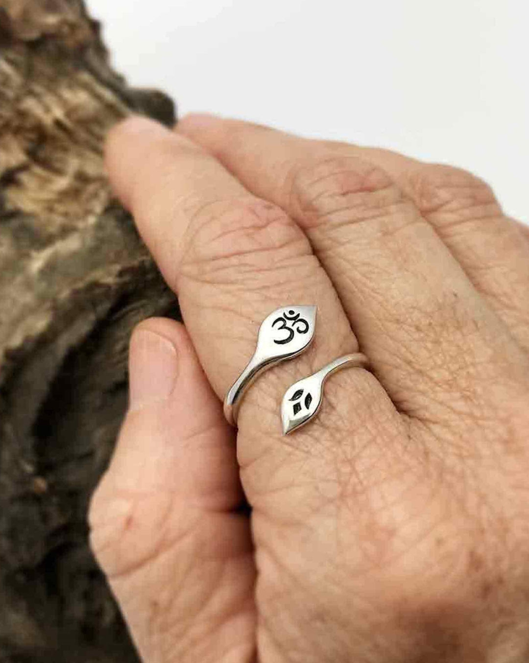 Sterling Silver Lotus and Om Ring on finger