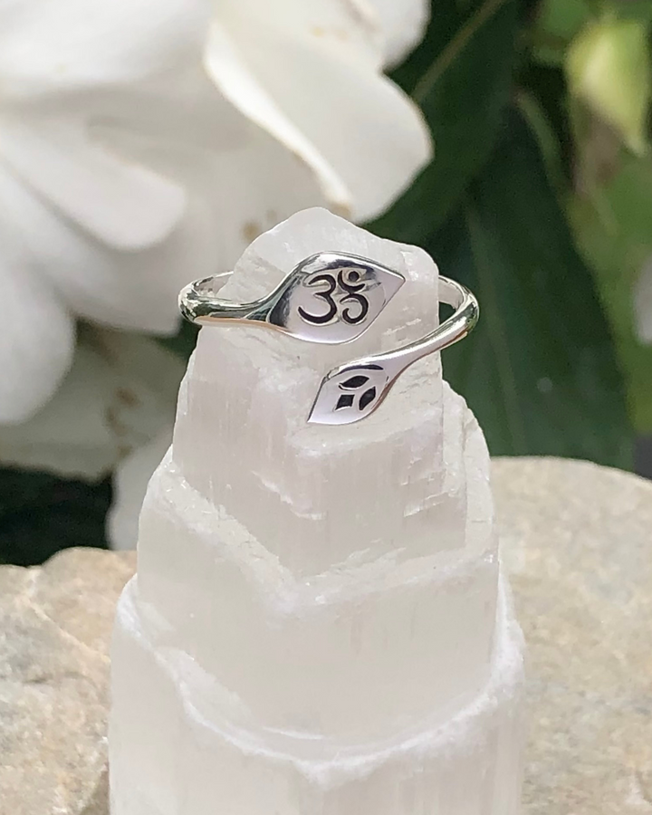 Sterling Silver Lotus and Om Ring on selenite stone 