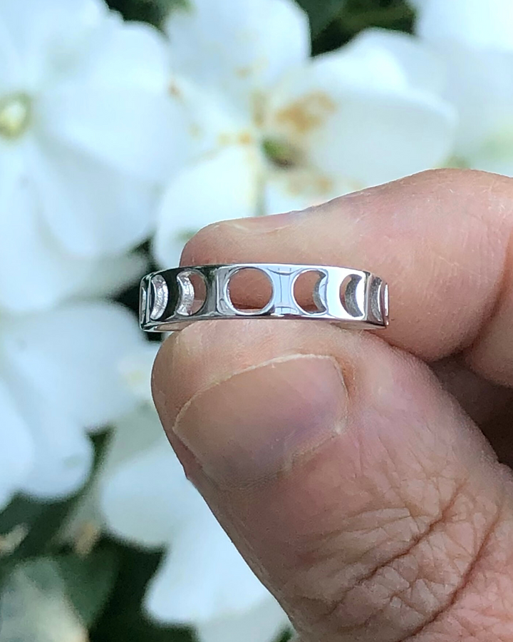 Sterling Silver Moon Phases Cut Out Ring between fingers
