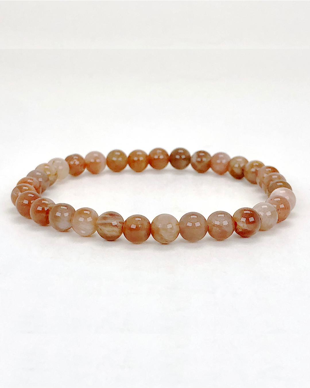 Sunstone 6mm Beaded Gemstone Bracelet on a white background.