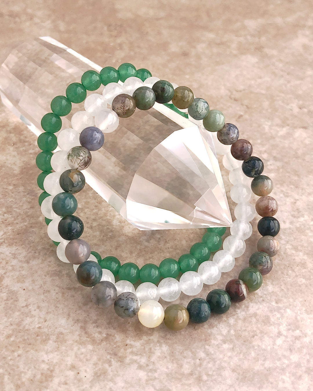 Aventurine, Snow Quartz and Indian Agate 6mm Beaded Gemstone Bracelet Set for Support and Grounding on a crystal.