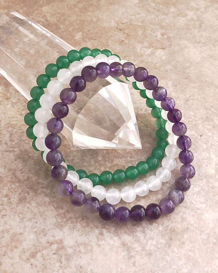 Amethyst, Snow Quartz and Aventurine 6mm beaded Gemstone Bracelet Set for Tranquility on a crystal.