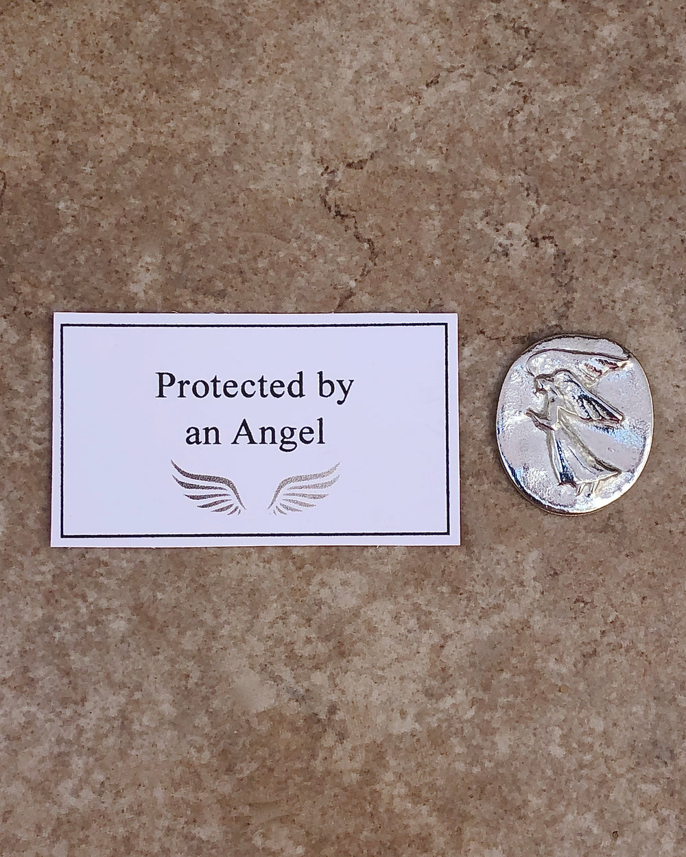 pewter pocket angel with protected by an angel card